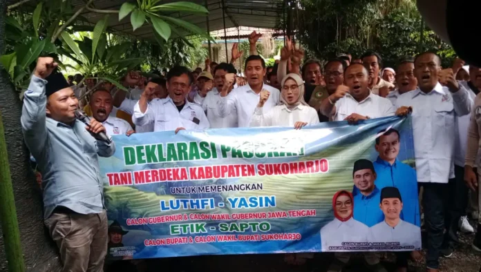 TANI Ratusan kader Tani Merdeka mengikuti apel siaga pemenangan pilkada di Kelurahan Dukuh, Kecamatan Sukoharjo, Jumat (22/11/2024).
